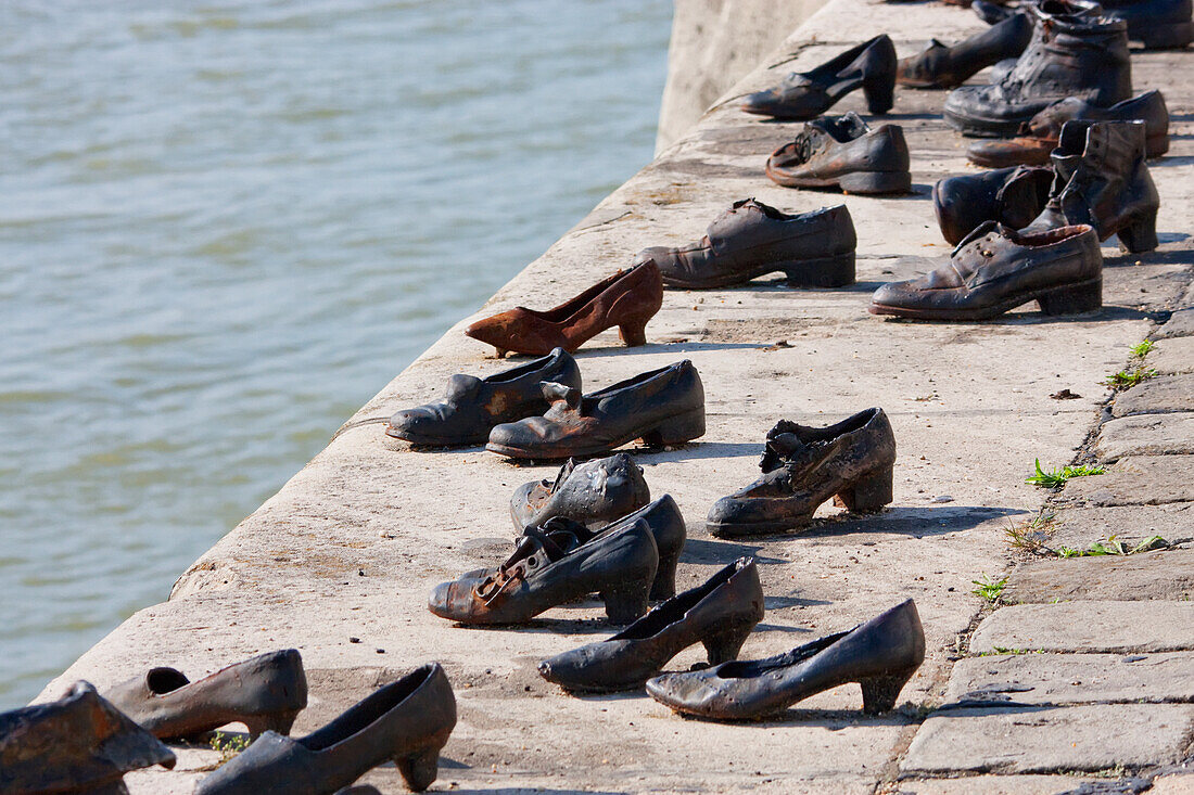 Shoes on the Danube, created by Gyula Pauer and Can Togay is a memorial to the Jews who fell victim to the Arrow Cross militiamen in Budapest and depicts their shoes left behind on the bank when they fell into the river after having been shot during World