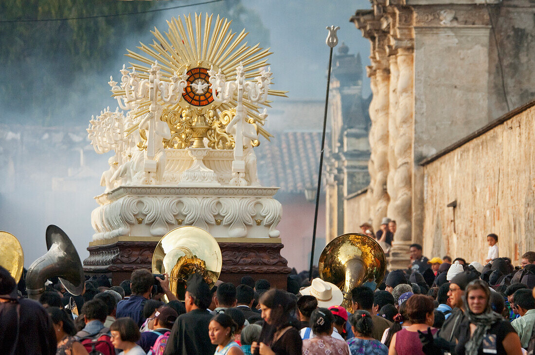 People following the anda (float) of the sorrowful Virgin Mary during the Holy Burial Procession on Good Friday in Antigua Guatemala, SacatepÃ©quez, Guatemala