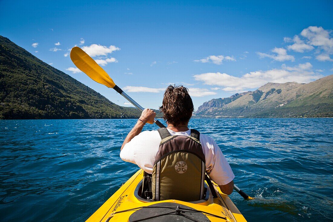 Kayakying at Guttierez lake in Estancia Peuma Hue, Lakes district, Patagonia, Argentina