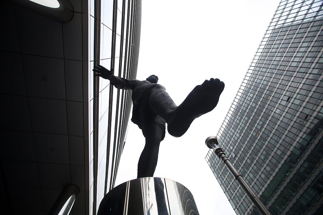 Statue of man walking on air outside the European Commission in Brussels, Belgium