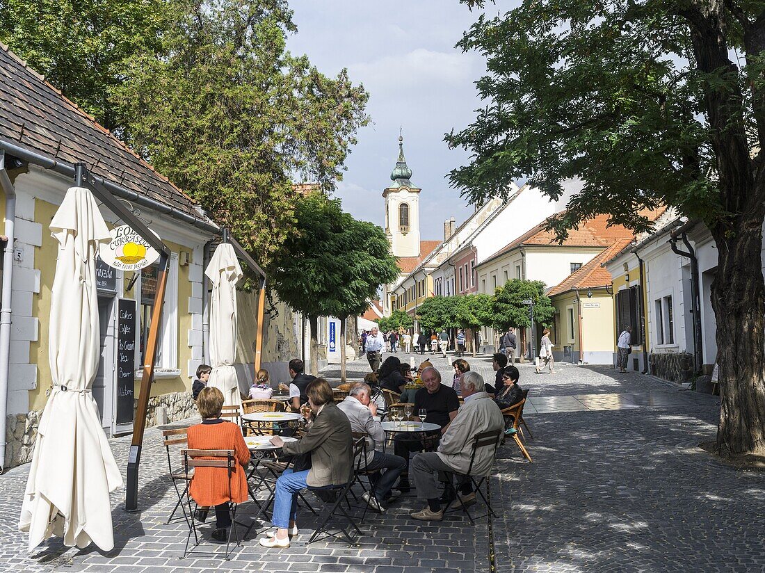 Szentendre near Budapest  Coffee shops in the town center with tourists  Szentendre, which calls itself the town of artists and churches, is located on the banks of river Danube close to Budapest and is one of the major attractions in Hungary  The little.