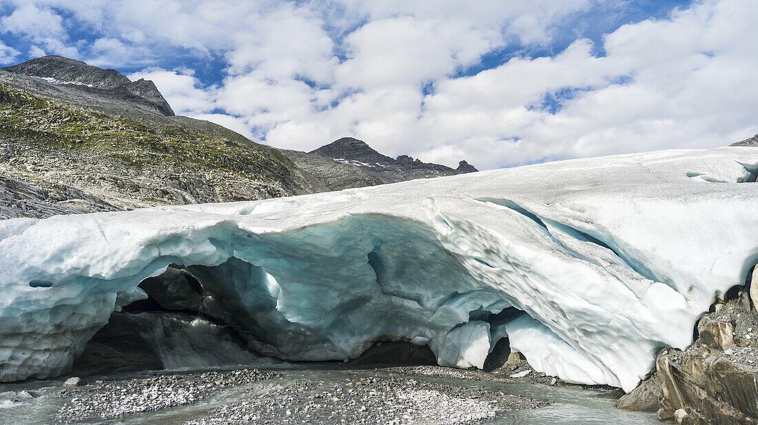 Valley head of valley Obersulzbachtal in the NP Hohe Tauern  Retreating glacier front of glacier Venedigerkees Obersulzbachkees with glacial stream and mouth  The National Park Hohe Tauern is protecting a high mountain environment with its characteristic.