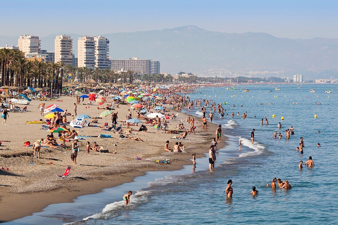 Torremolinos, Malaga Province, Costa del Sol, Spain  Crowded Bajondillo beach in high season