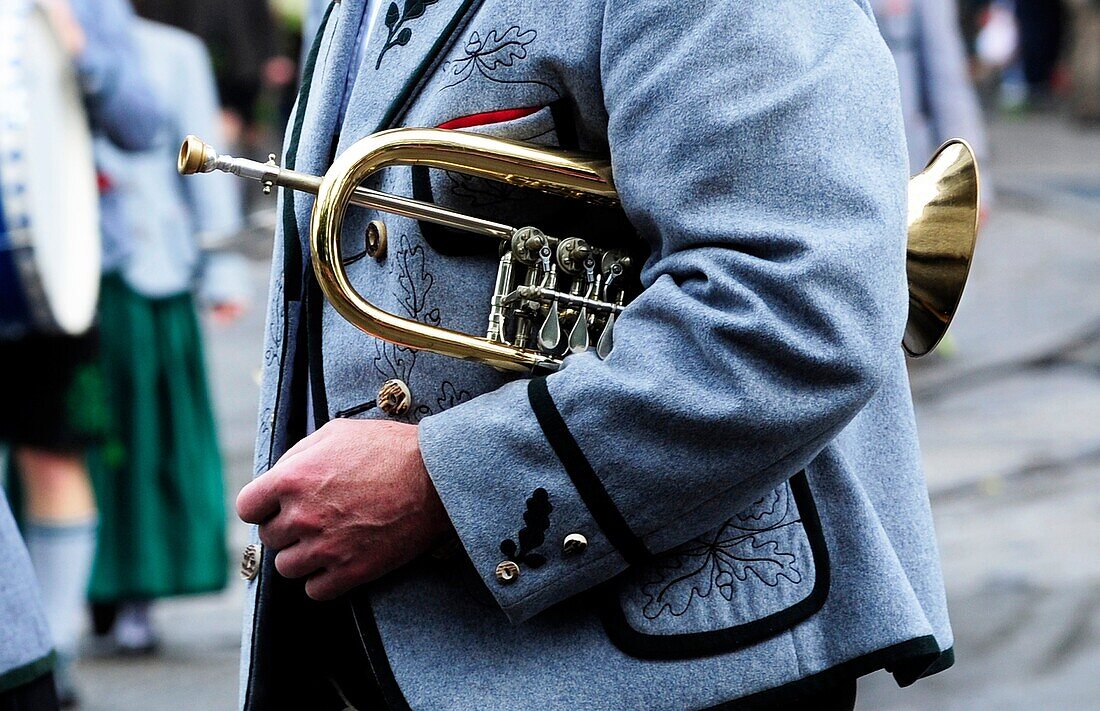 Member of a typical bavarians drum band in Oktoberfest in Munich,close-up of trumpet,Germany