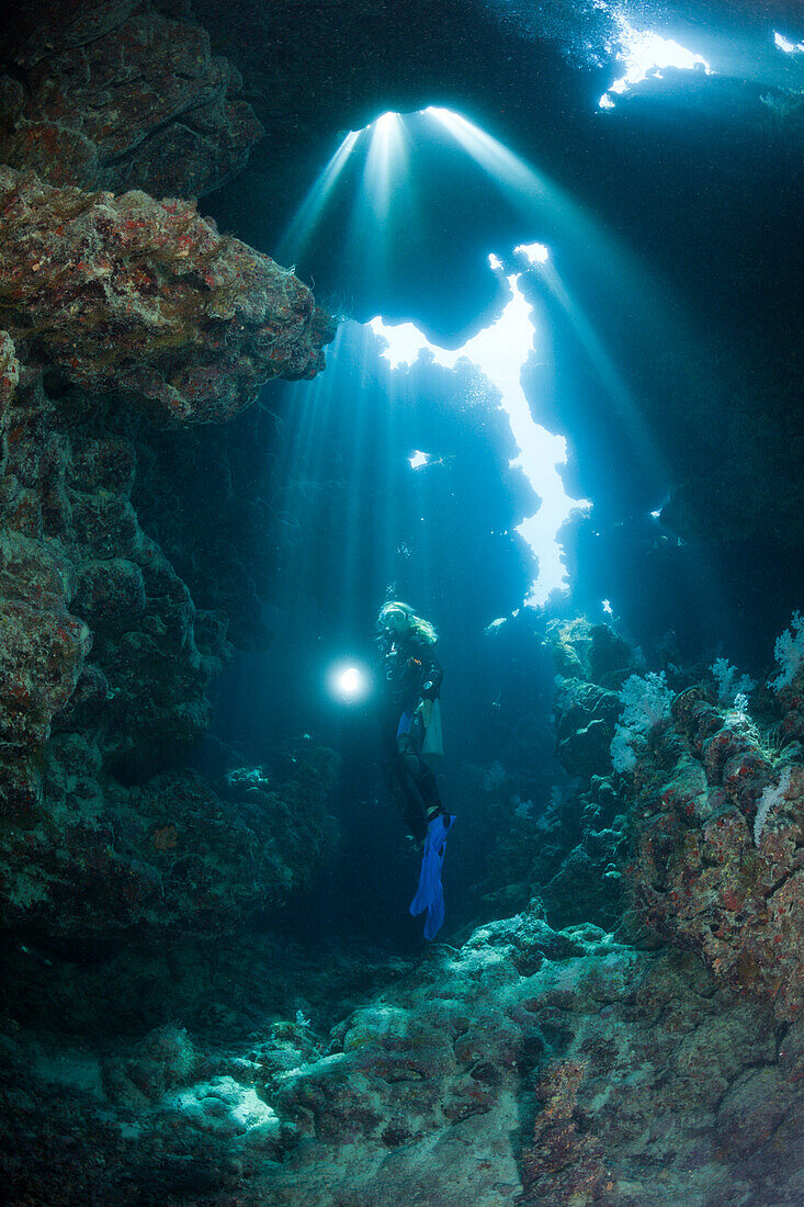 Scuba Diver inside Cave, Zabargad, Red Sea, Egypt