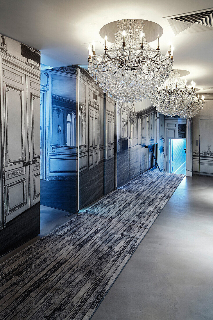 Hallway with chandelier at Hotel La Maison Champs-Elysees, designed by Martin Margiela, Paris, France