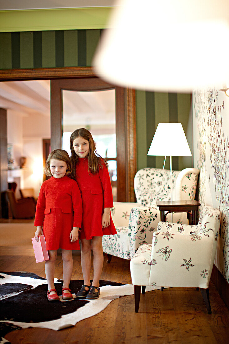 Girls in the salon of Hotel Haus Hirt, Bad Gastein, St. Johann im Pongau, Salzburg, Austria