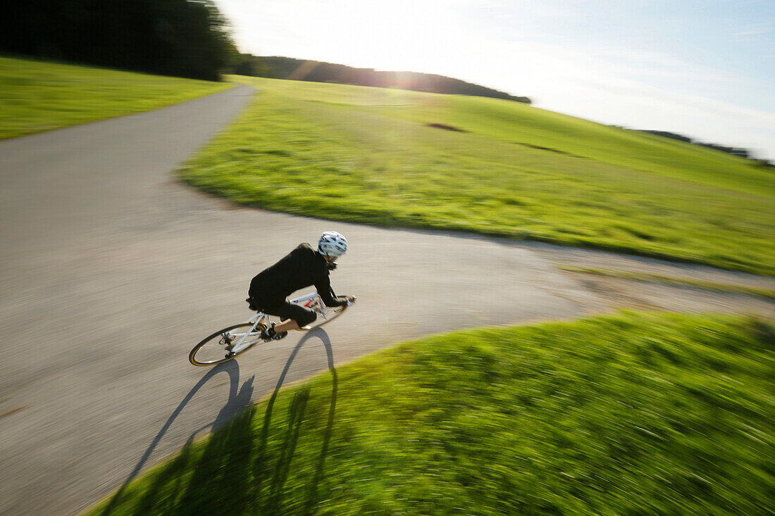 Man cyclocross touring in autumn, Oberambach, Munsing, Bavaria, Germany