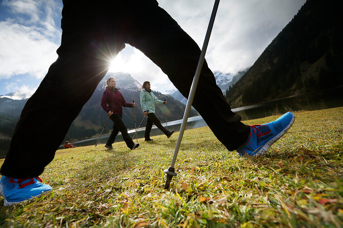 Nordic Walkers at lake Vilsalpsee, Tannheim, Tannheim Valley, Tyrol, Austria