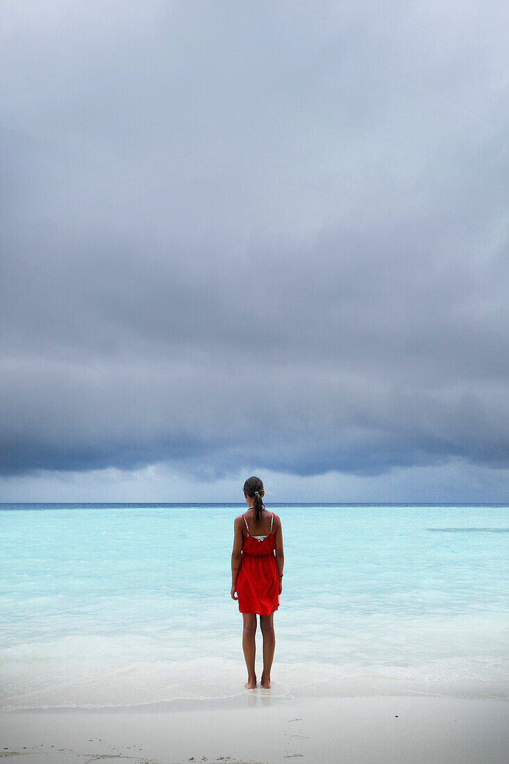 Girl at beach, Biyadhoo Island, South Male Atoll, Maldive Islands