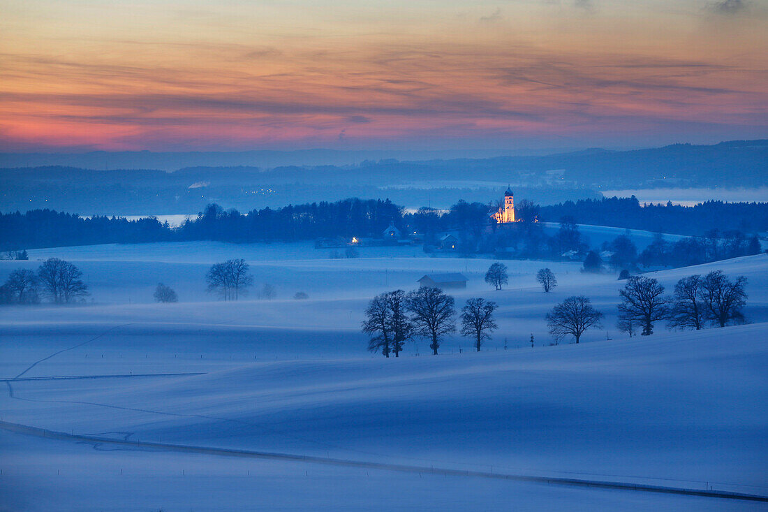 View to Holzhausen with parish church of St. John the Baptist in twilight, Holzhausen, Munsing, Bavaria, Germany