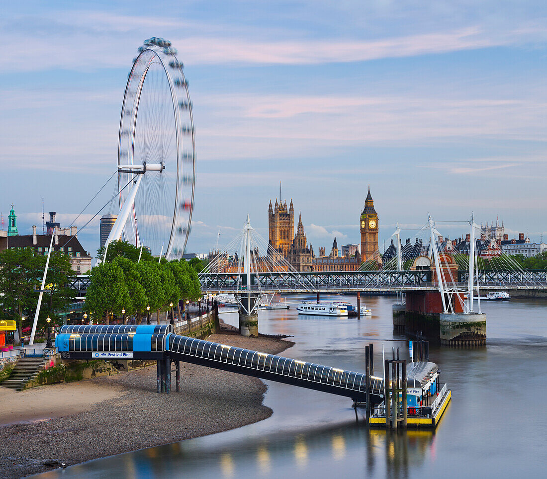 Big Ben with the Hungerford Bridge and London Eye in the evening, London, England
