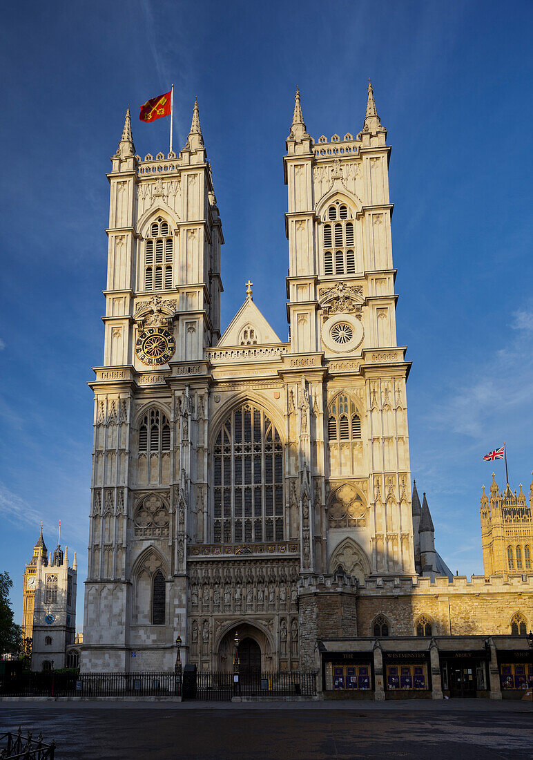 Westminster Abbey with both towers and central fassade with the shadow across the yard Westminster City, London, England