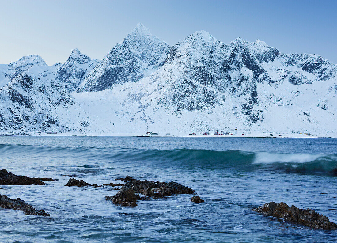 Rocky coast near Vareid in the direction of Flakstad, Stortinden, Flakstadoya, Lofoten, Nordland, Norway