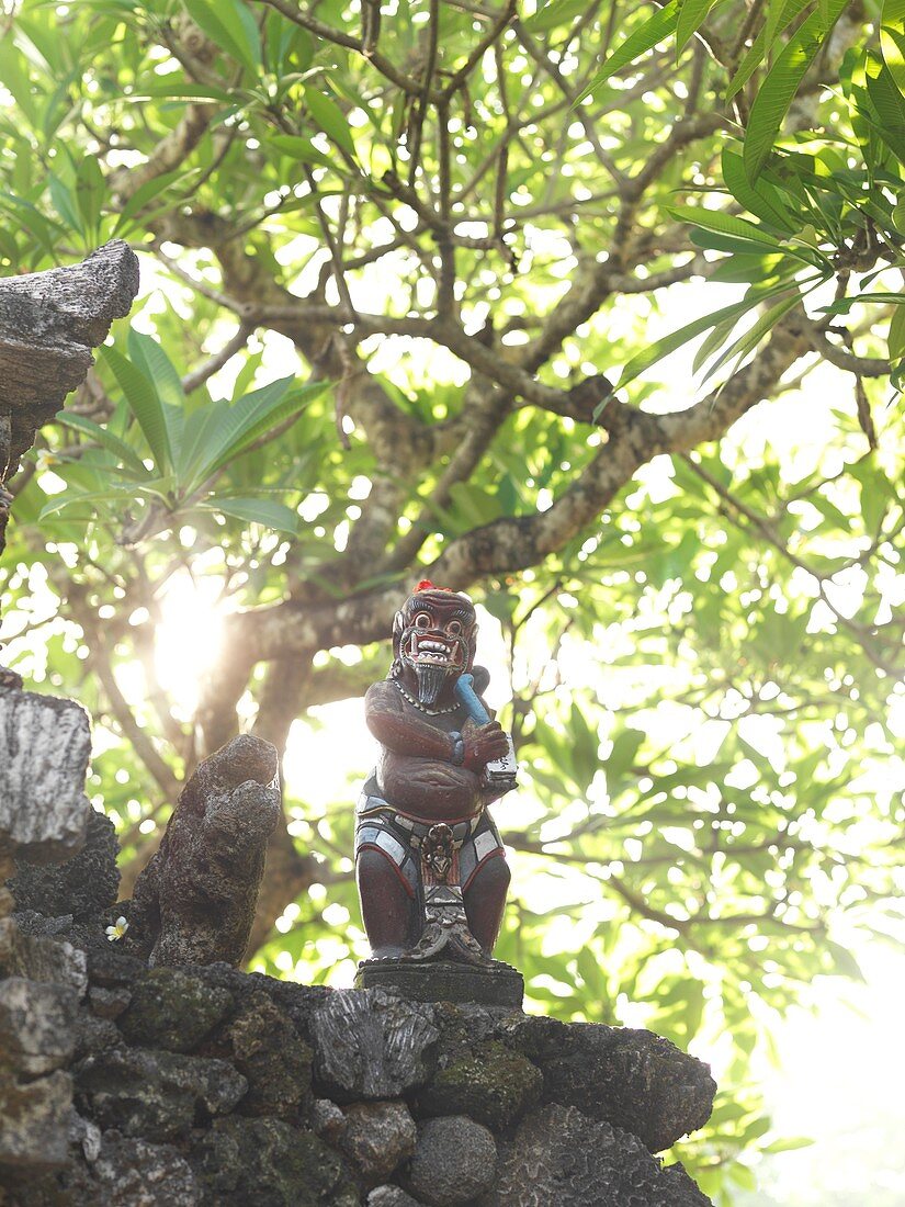 A Balinese monkey god statue at an altar