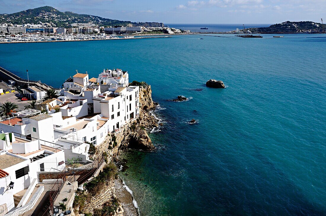 Houses perched on rocks in Sa Peña neighborhood  Ibiza, Balearic Islands, Spain