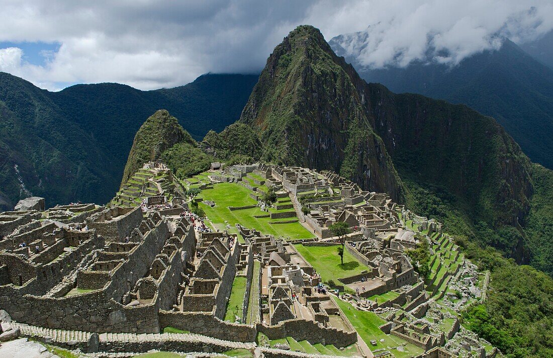 Machu Picchu famous Inca ruins on mountain looking down in Peru historical Wonder of the World