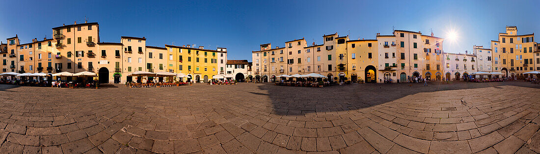 A 360° panorama of the elliptical shaped Piazza dell’Anfiteatro in Lucca on a sunny afternoon, Tuscany, Italy