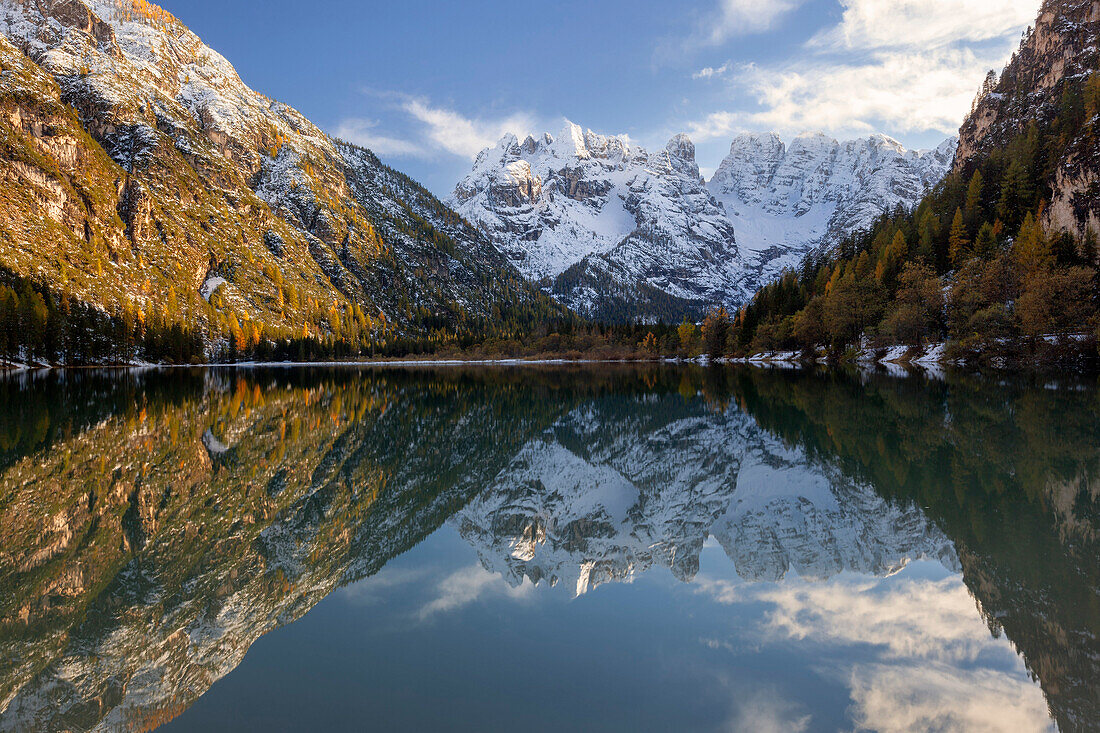Evening atmosphere at Lago di Landro with view to M. Cristallo in autumn, South Tyrol, Italy