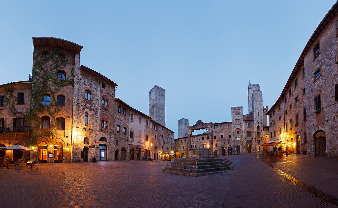 Towers and fountains on Piazza della Cisterna square, San Gimignano, hill town, UNESCO World Heritage Site, province of Siena, Tuscany, Italy, Europe