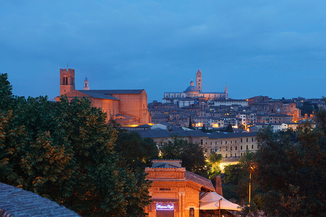 Cityscape with Basilika San Domenico and Duomo Santa Maria cathedral at night, Siena, UNESCO World Heritage Site, Tuscany, Italy, Europe