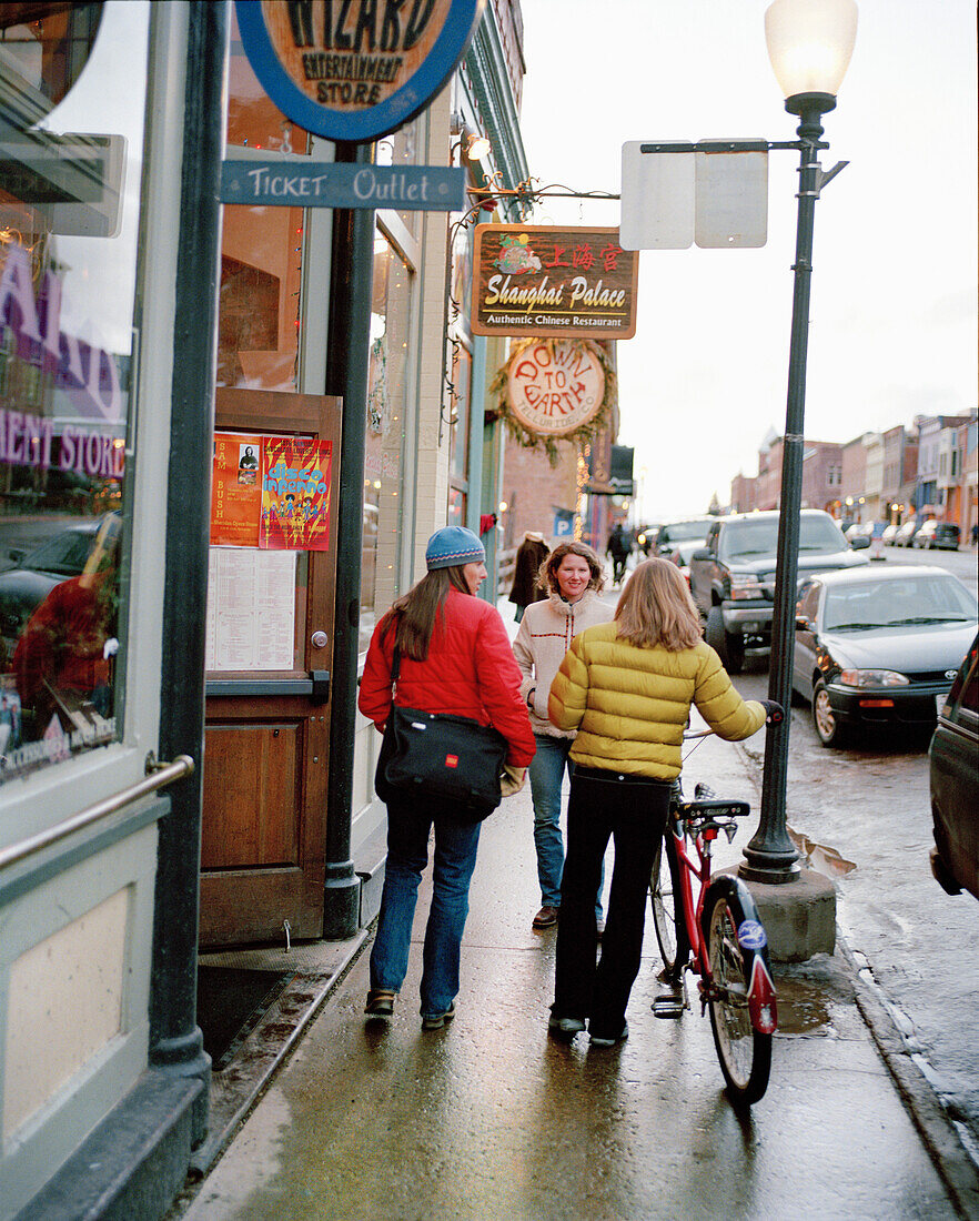 USA, Colorado, women socializing in the ski town of Telluride