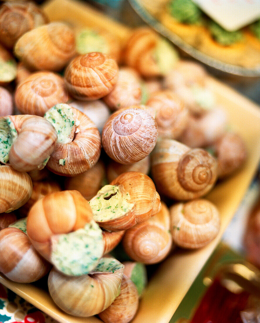 FRANCE, Noyers, Burgundy, close-up of escargots in a small market