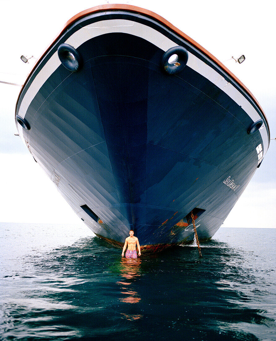 FRANCE, boy standing in the front of a the Sea Dream II, Nice