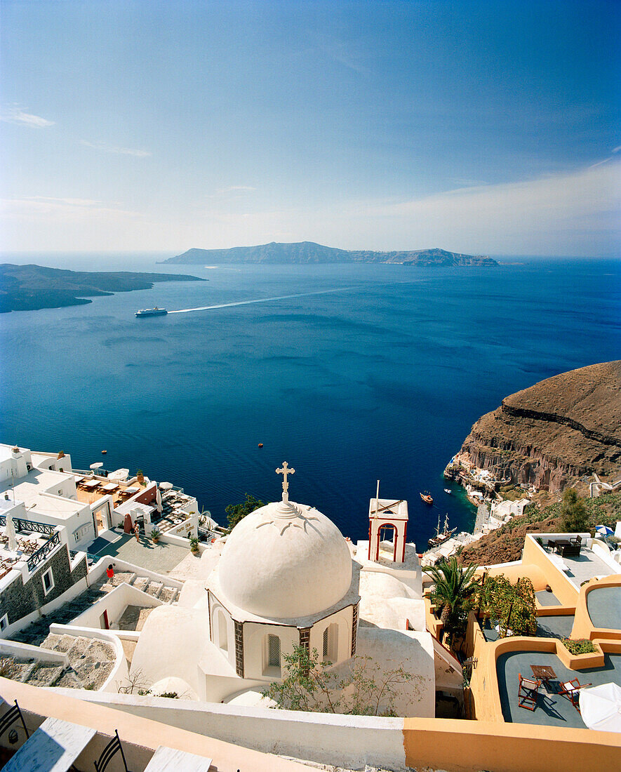 GREECE, Santorini, Fira, view of a chapel and the Mediterranean Sea as seen from the Sphinx Restaurant
