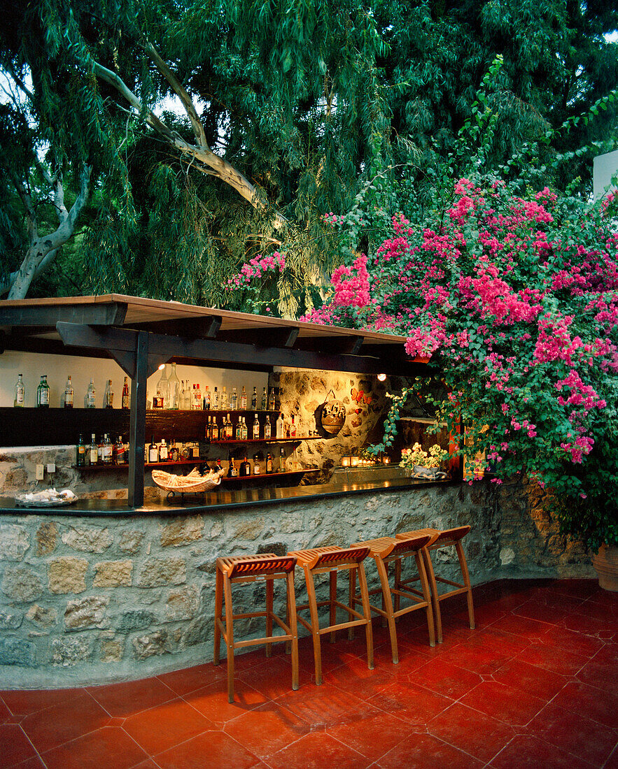 GREECE, Patmos, Grikos, Dodecanese Island, outdoor bar area at the Petra Hotel
