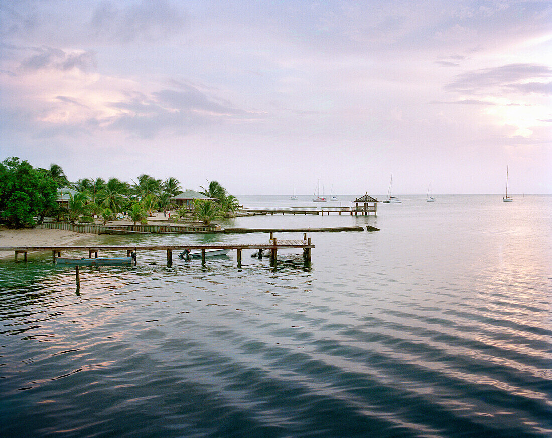 HONDURAS, Roatan, seascape with piers, Halfmoon Bay
