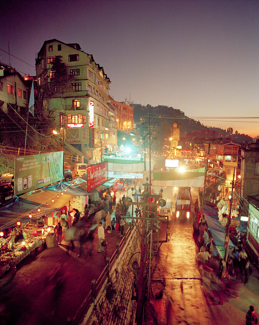 INDIA, West Bengal, street and market scene at night, Darjeeling