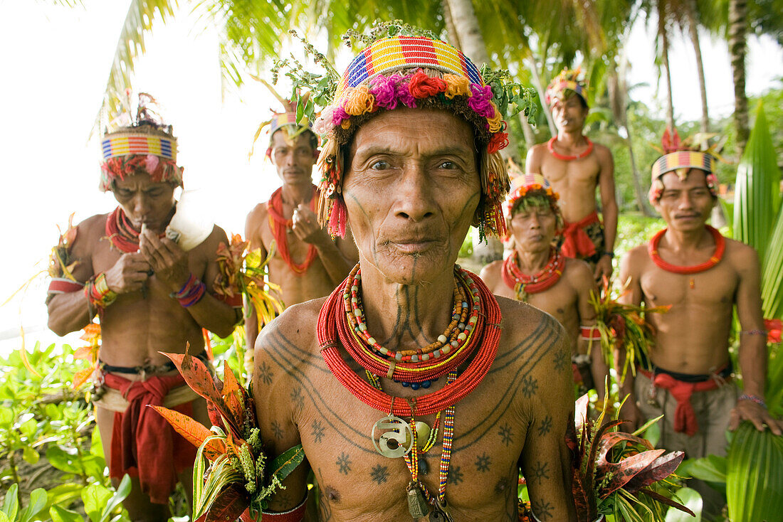 INDONESIA, Mentawai Islands, Kandui Resort, group of male healers from the Sakobou tribe