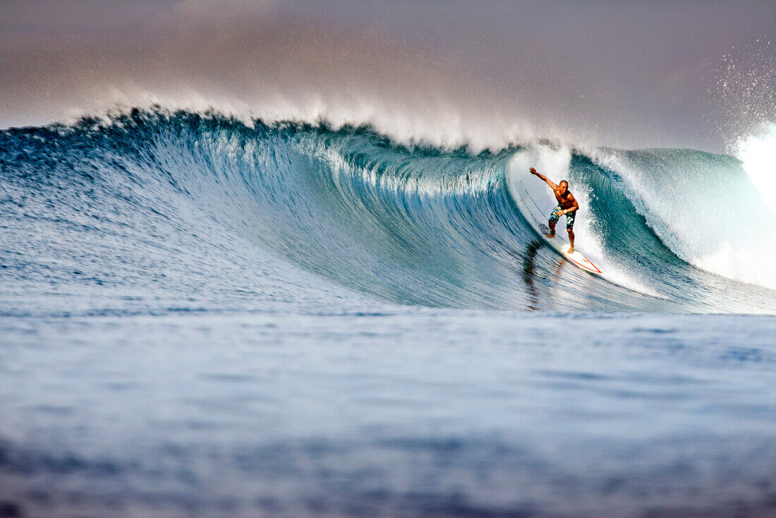 INDONESIA, Mentawai Islands, a man surfing a wave called Bankvaults