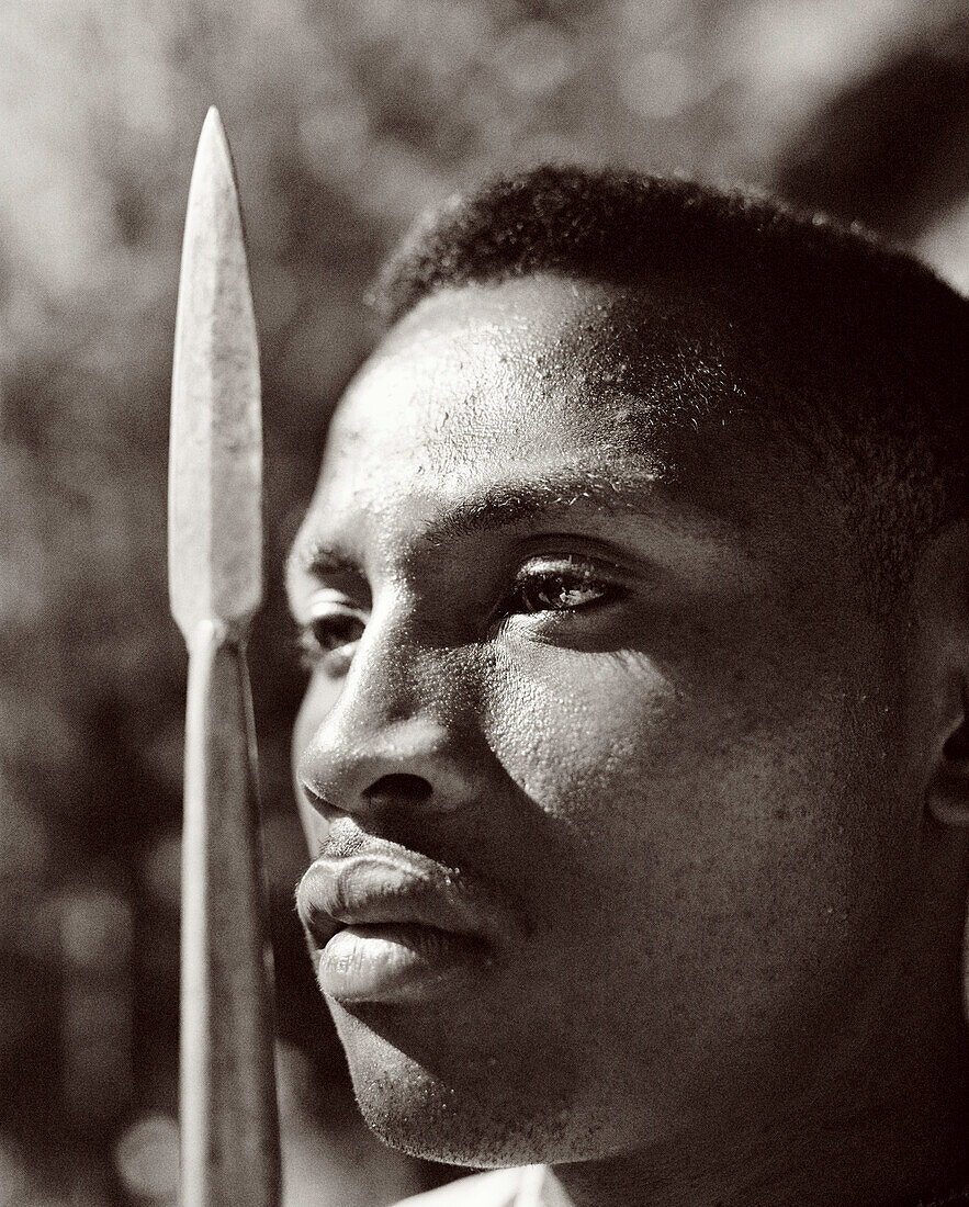 MADAGASCAR, mid adult man holding spear, close-up, Beza Mahafaly (B&W)