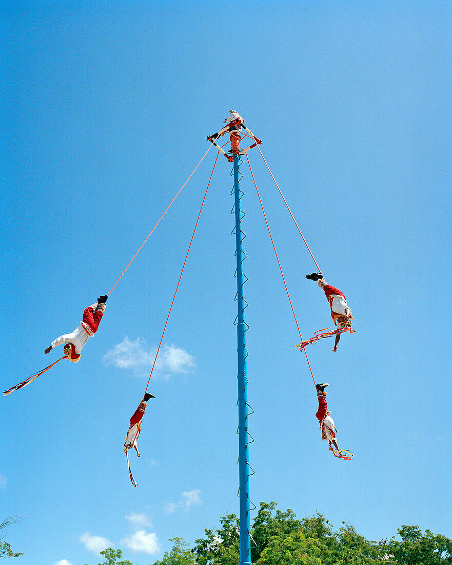 MEXICO, Maya Riviera,Totonac Indians pole flying, Tulum Ruins