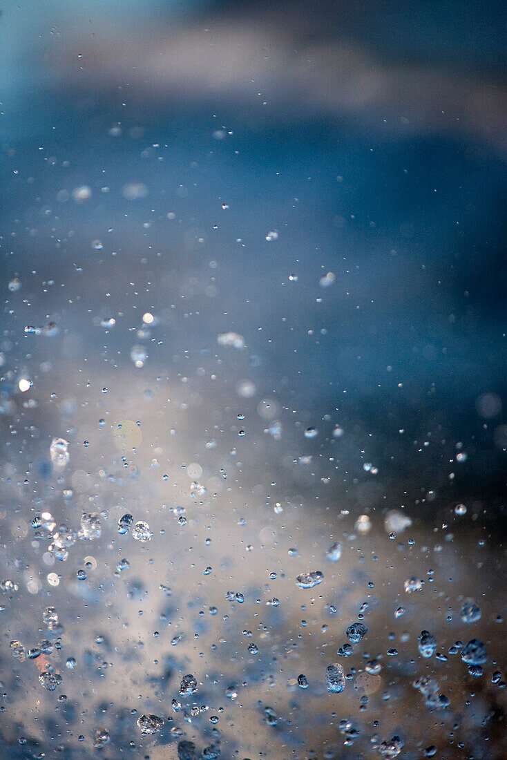 MEXICO, Baja Sur, water drops fly through the air from the motor of a fishing boat, Magdalena Bay