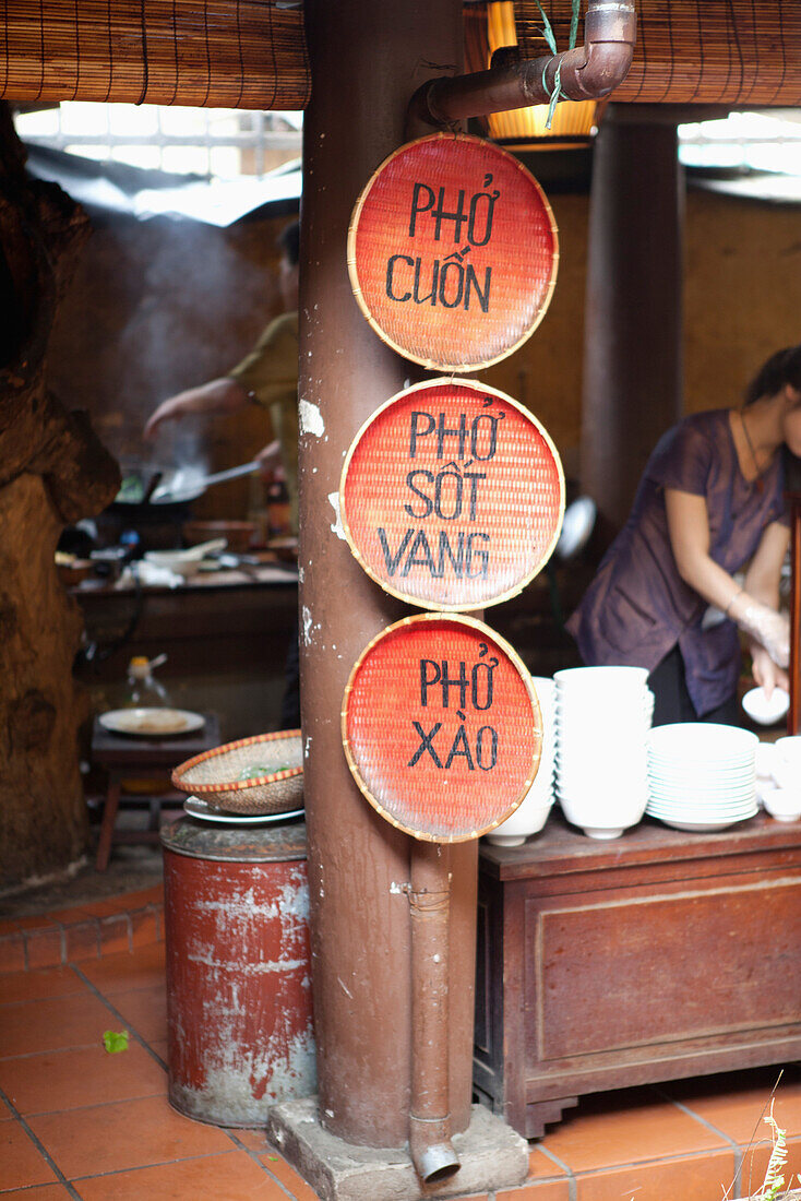 VIETNAM, Hanoi, traditional street food restaurant called Quan An Ngon, a list of menu items from this particular food stall
