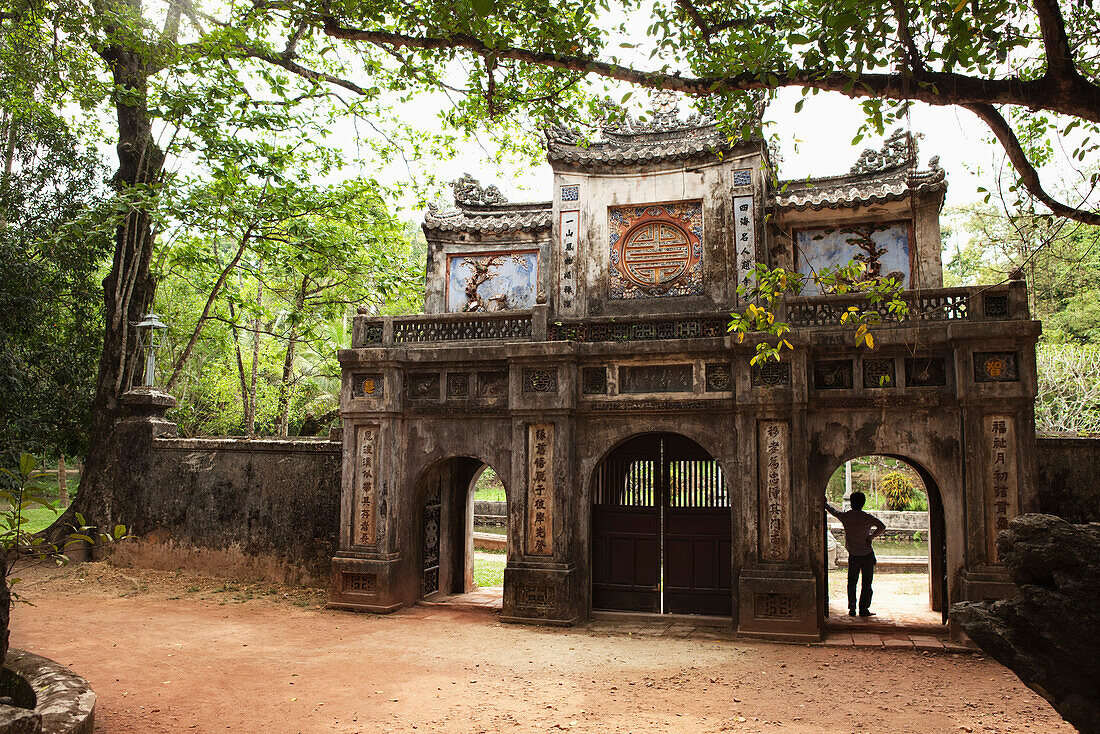 VIETNAM, Hue, the entrance into Tu Hieu Pagoda and monastery, adorned in historic Vietnamese architecture