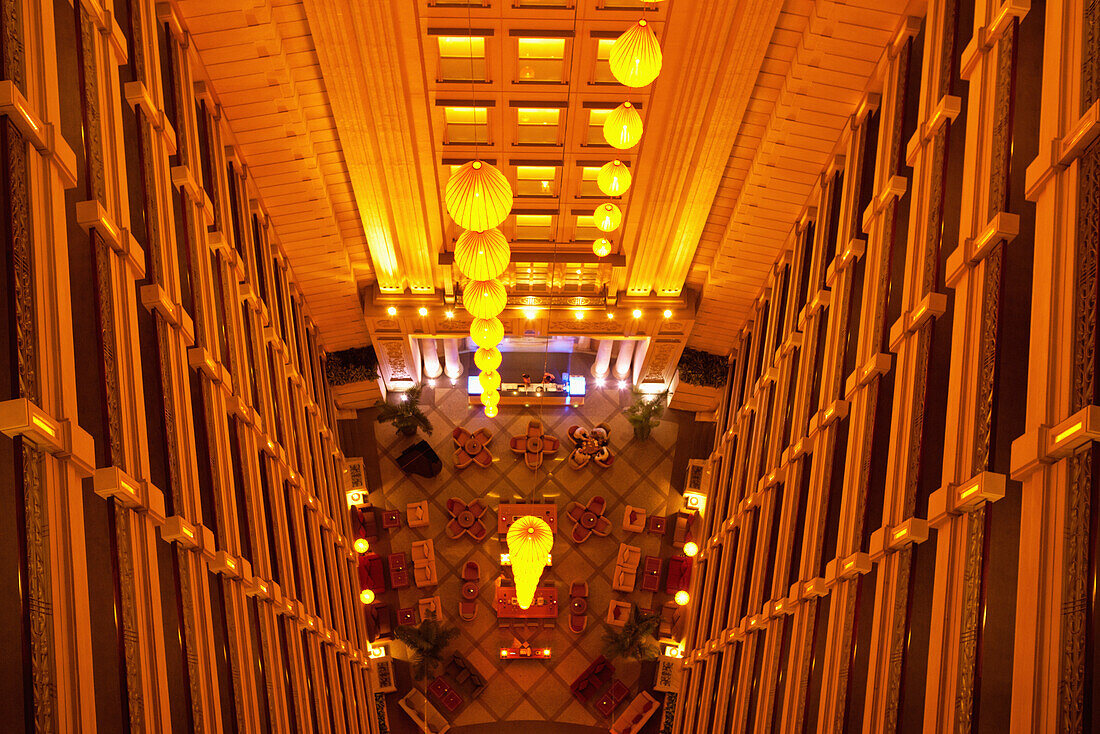 VIETNAM, Saigon, Ho Chi Minh City, looking down into the lobby of the Renaissance Riverside Hotel from the top floor