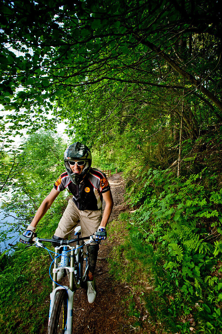 Downhill mountain biker off-roading, Frauenalpe, Murau, Styria, Austria