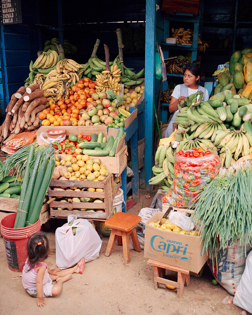 PERU, Amazon Rainforest, South America, Latin America, fruit and vegetables displayed at market stall in Puerto Maldonado