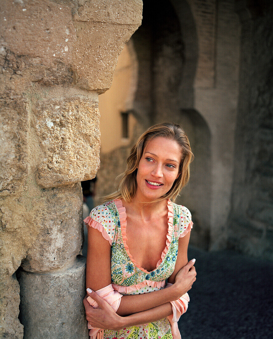 SPAIN, Andalusia, Tarifa, young woman smiling