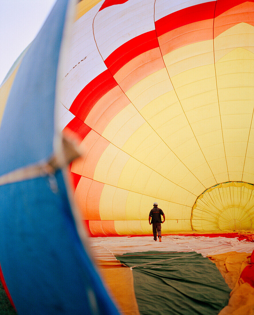 SRI LANKA, Asia, rear view of a man walking in a hot air balloon