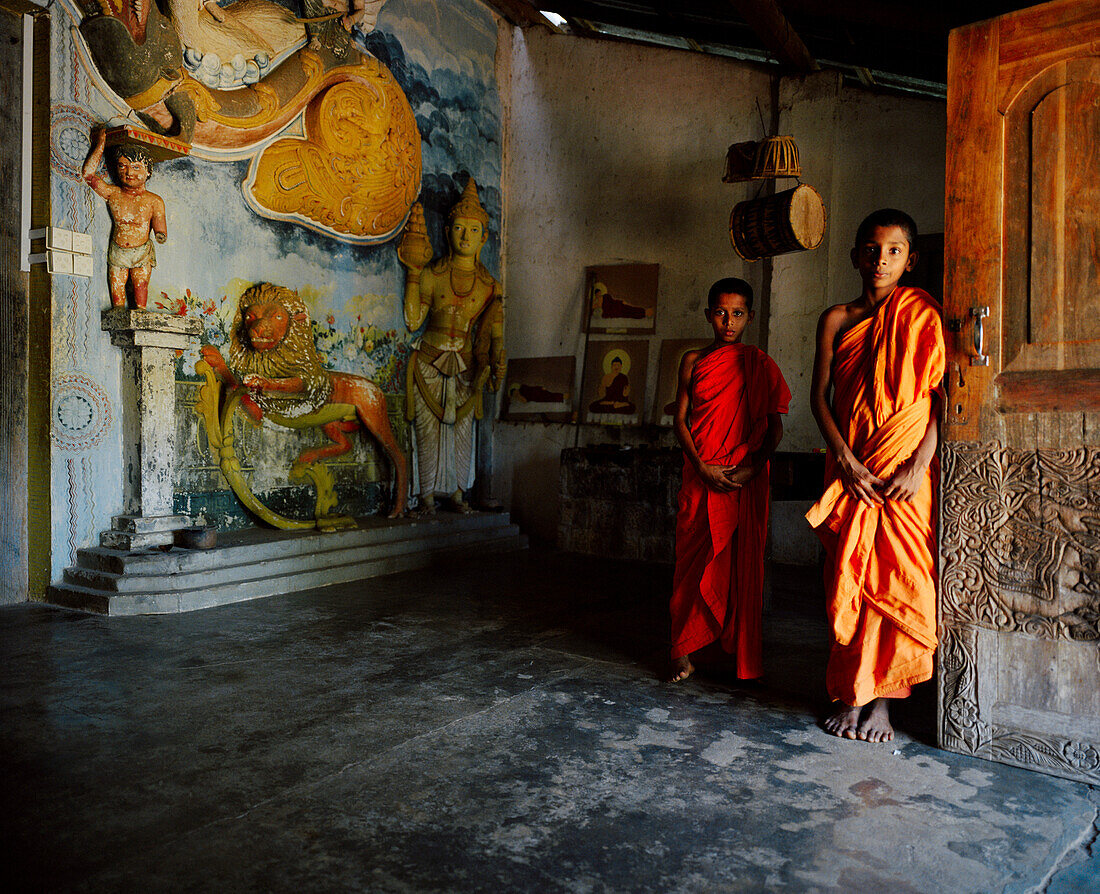 SRI LANKA, Asia, portrait of two young monks standing in the Pidurangala Temple