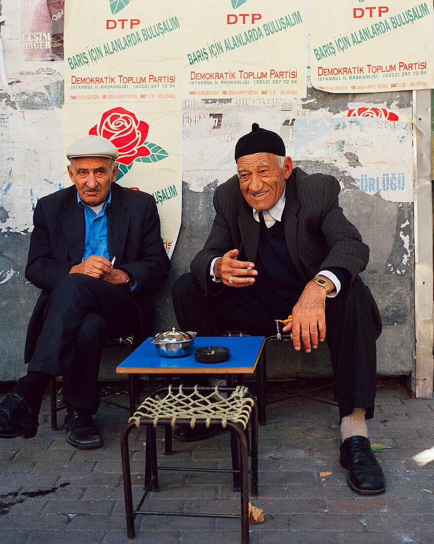 TURKEY, Istanbul, portrait of smiling senior men at tea stall