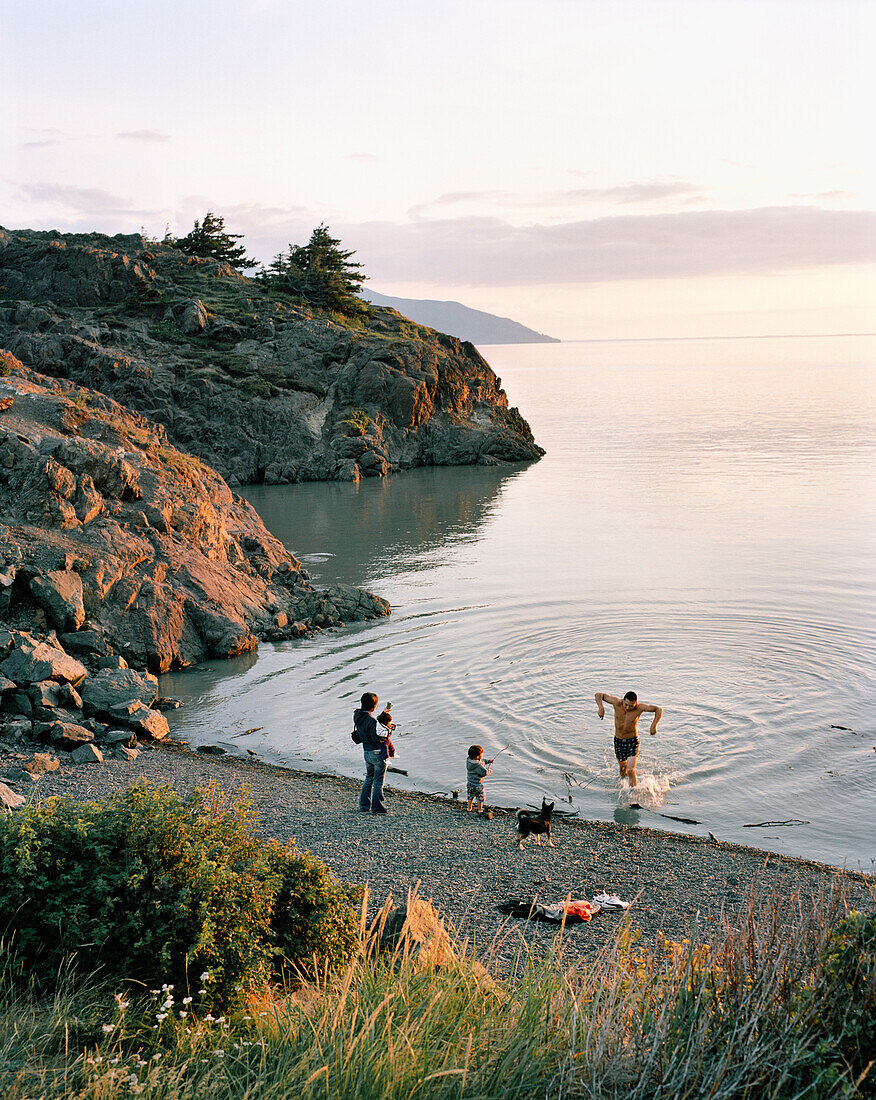 USA, Alaska, Resurrection Bay, people at water's edge, elevated view