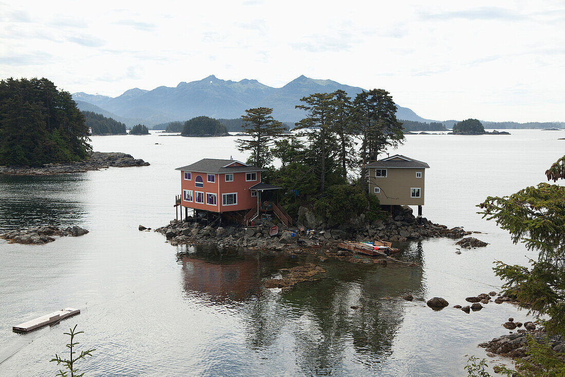 ALASKA, Sitka, homes perched on a small island in the Sitka Sound, Crescent Bay