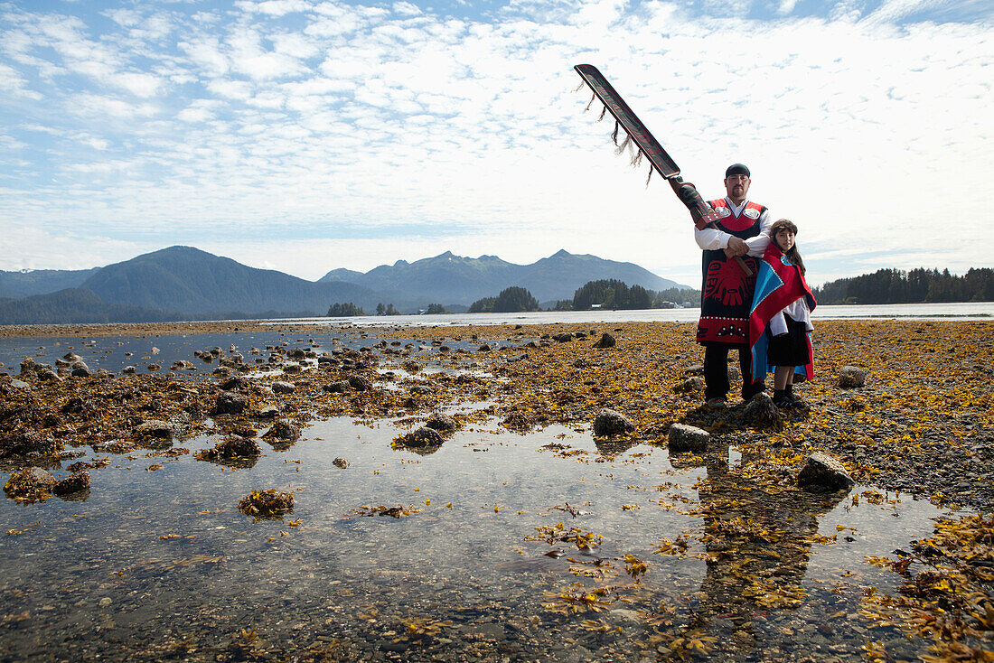 ALASKA, Sitka, Sheeta Kwan Naa Kahidi dancers in traditional costume, Nathan Howard with his daughter Alice, Sitka Sound