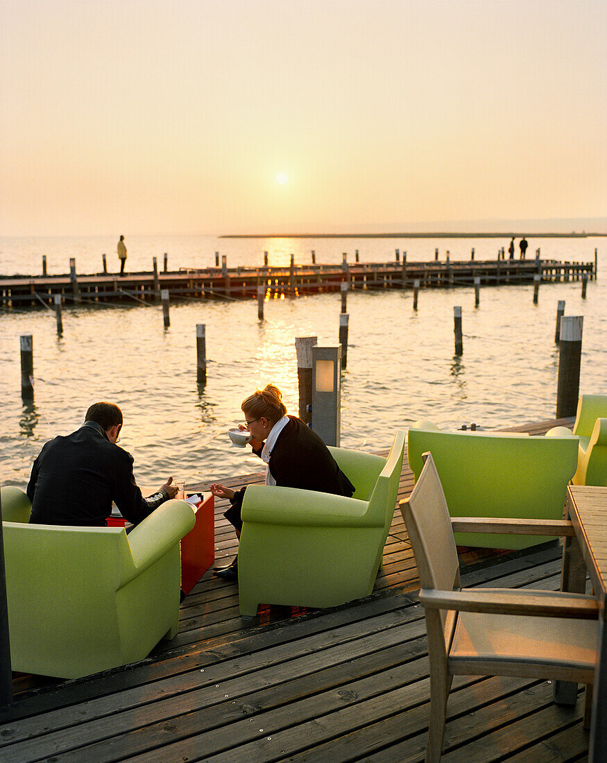 AUSTRIA, Neusiedl Am See, afternoon coffee at the Mole West Café and Bar Restaurant, Lake Neusiedler See, Burgenland
